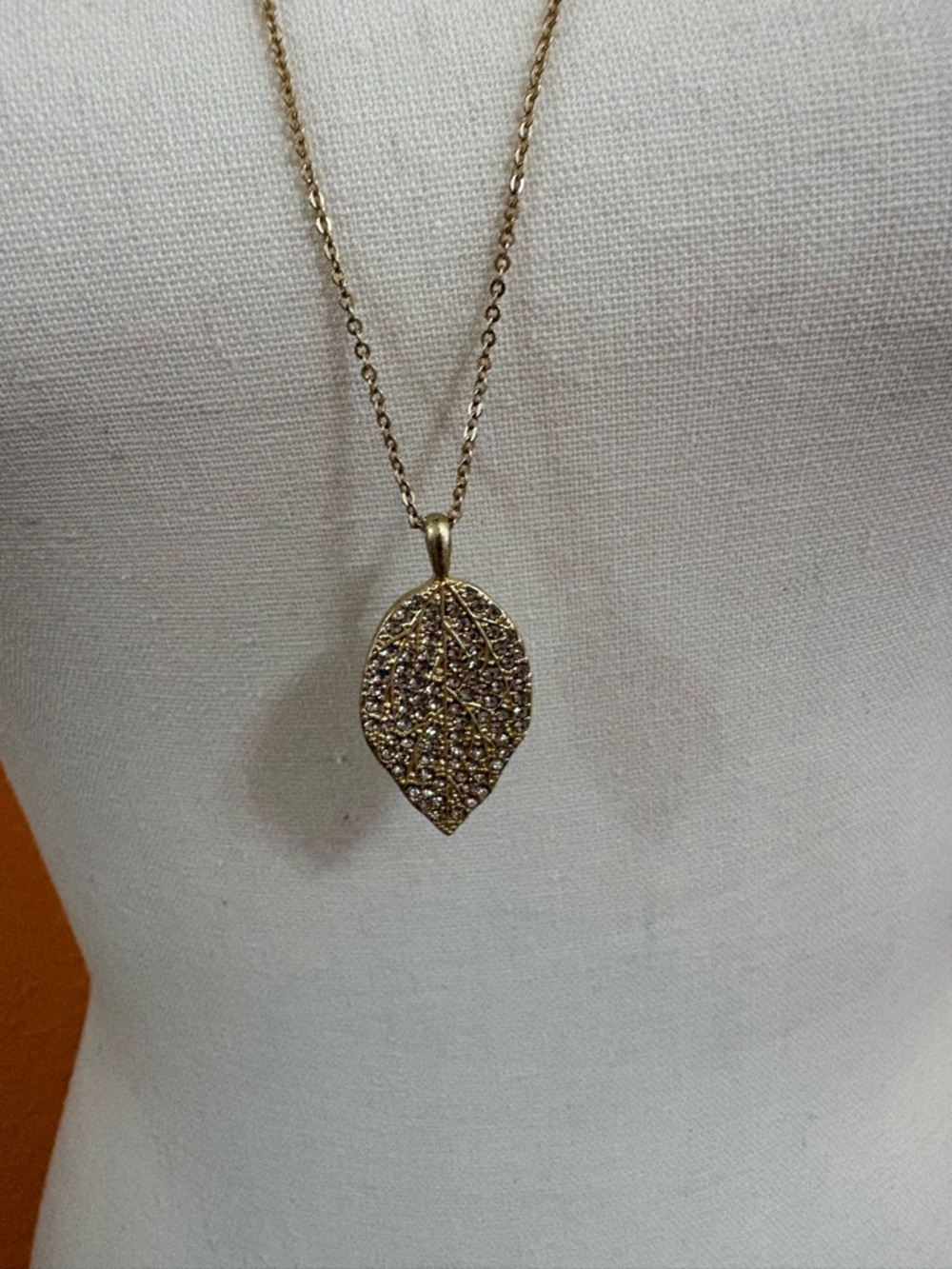 Lia Sophia Gold Leaf Pendant Necklace with Crystal Accents